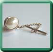 Oval pearl bezel tie tack